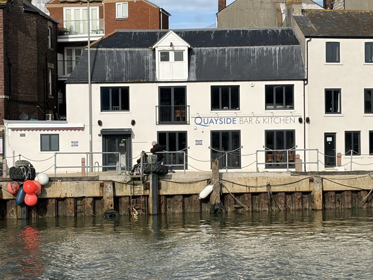 Harbourside exterior view of The Quayside Bar and Kitchen Restaurant, Weymouth Harbour.