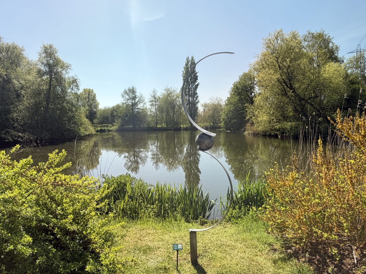 Contemporary sculpture overlooking the lake at Sculpture By The Lakes near Dorchester, Dorset
