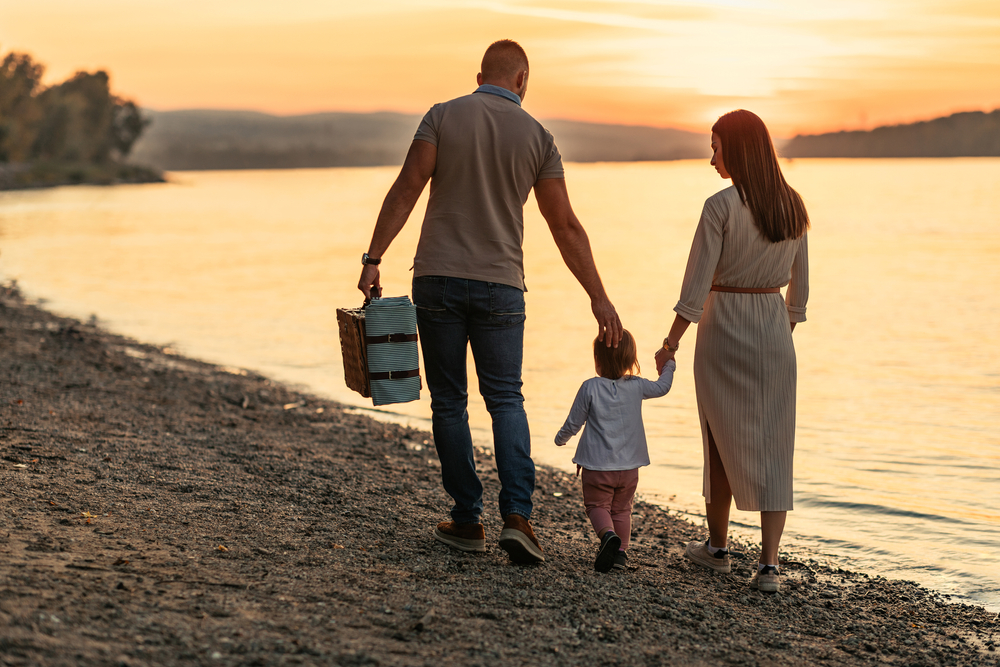 Family enjoying a summer holiday on the Dorset coast