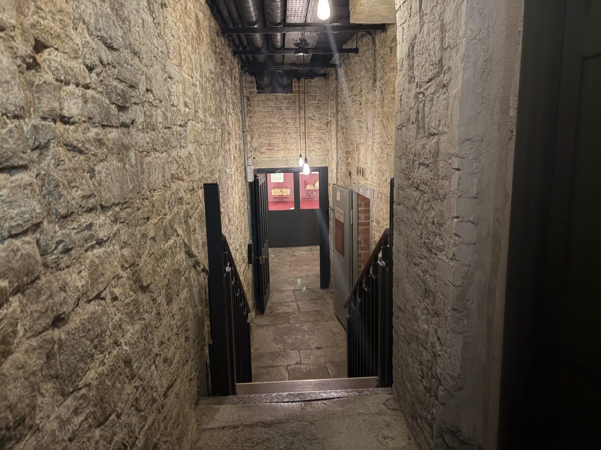 Historic stone corridor inside Shire Hall Museum in Dorchester, Dorset