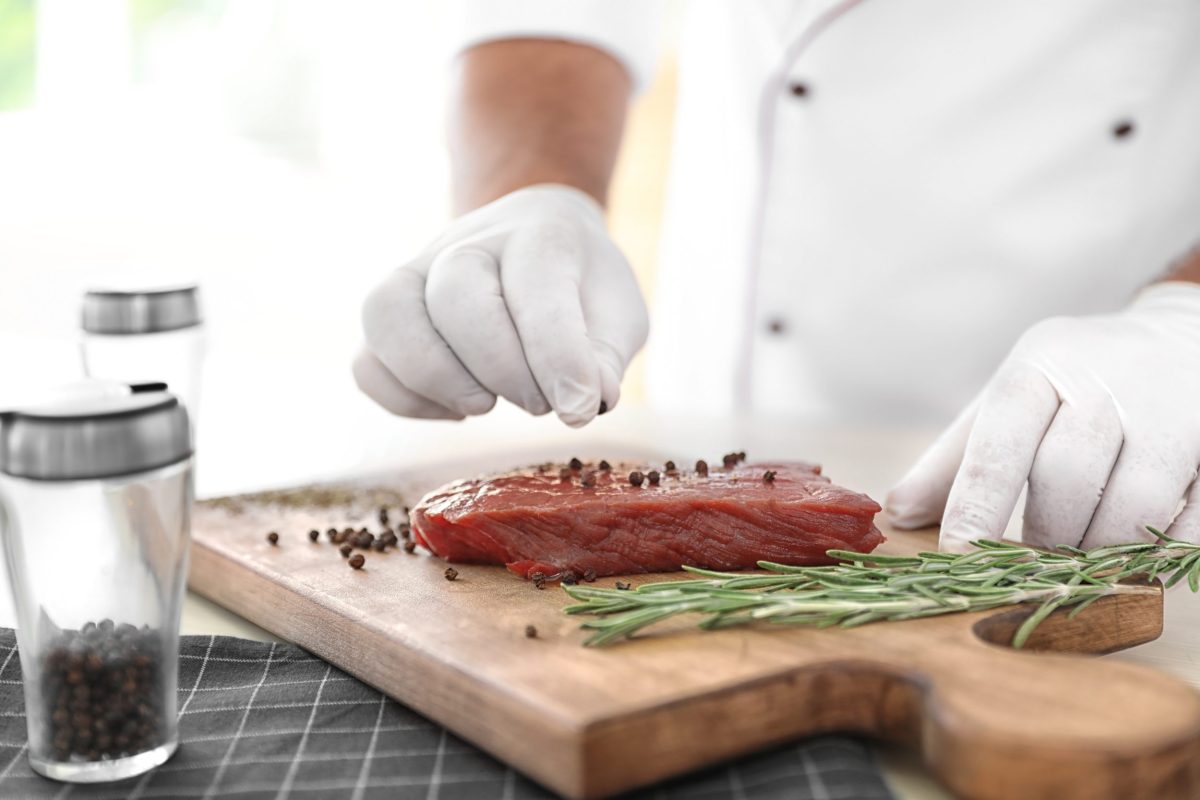 Private chef preparing a luxury dining experience in a Dorset holiday cottage