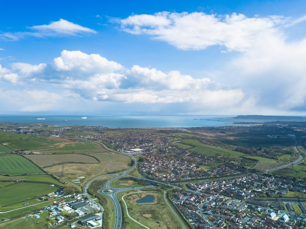 Aerial view towards Weymouth and Dorset's coastline, just a short drive from Dorchester