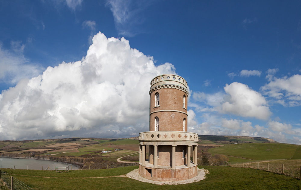 Clavell Tower overlooking Kimmeridge Bay and the rolling Purbeck Hills on Dorset's Jurassic Coast.