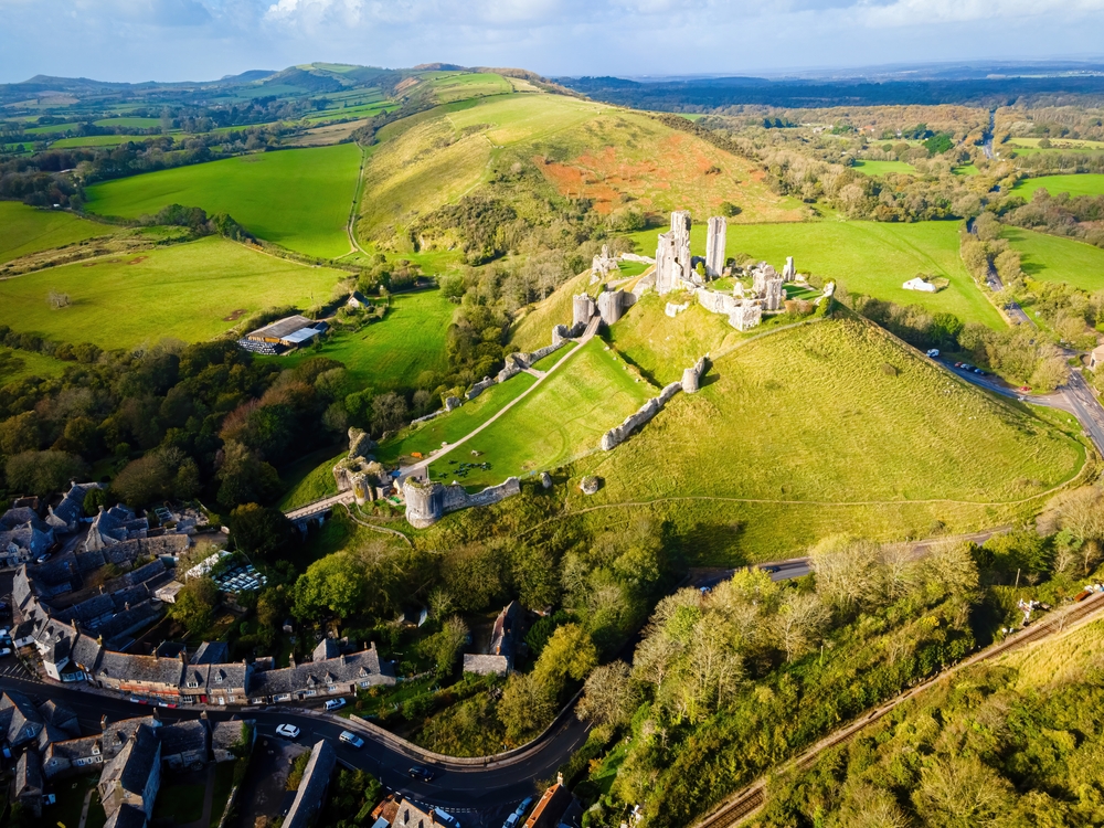 Aerial view of the historic ruins of Corfe Castle in the Isle of Purbeck, Dorset