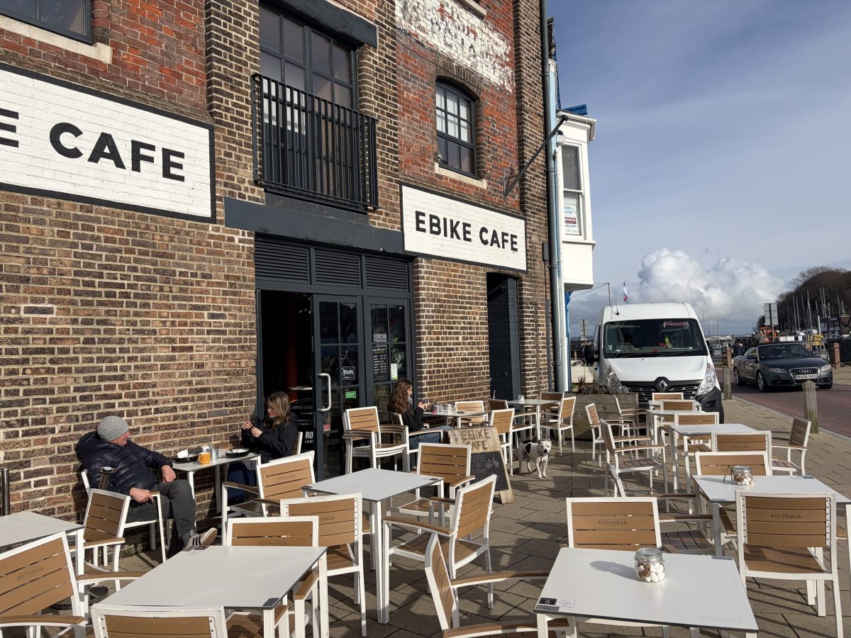Outdoor seating at EBIKE Café overlooking Weymouth Harbour in Dorset.