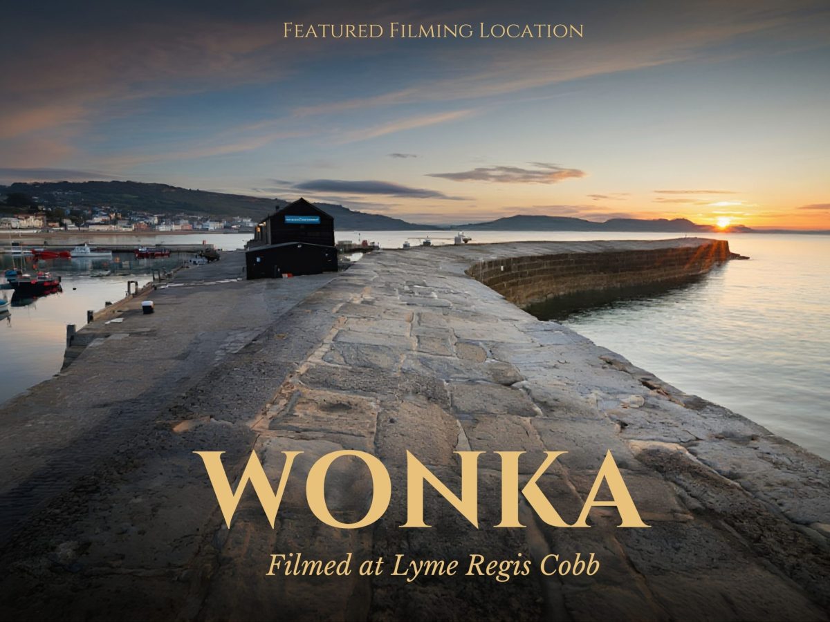 Movie-style poster featuring Wonka at Lyme Regis Cobb on Dorset's Jurassic Coast.