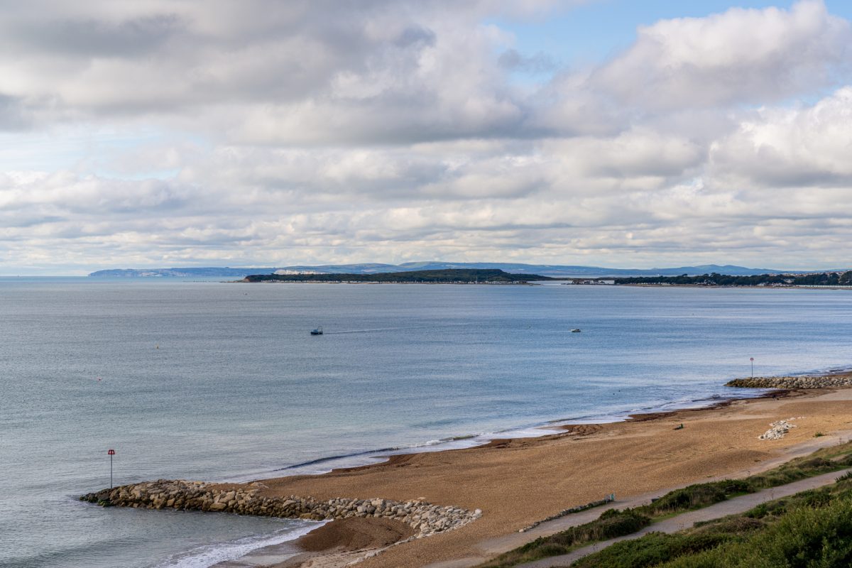 Highcliffe and Avon Beach, Dorset, beneath dramatic skies.