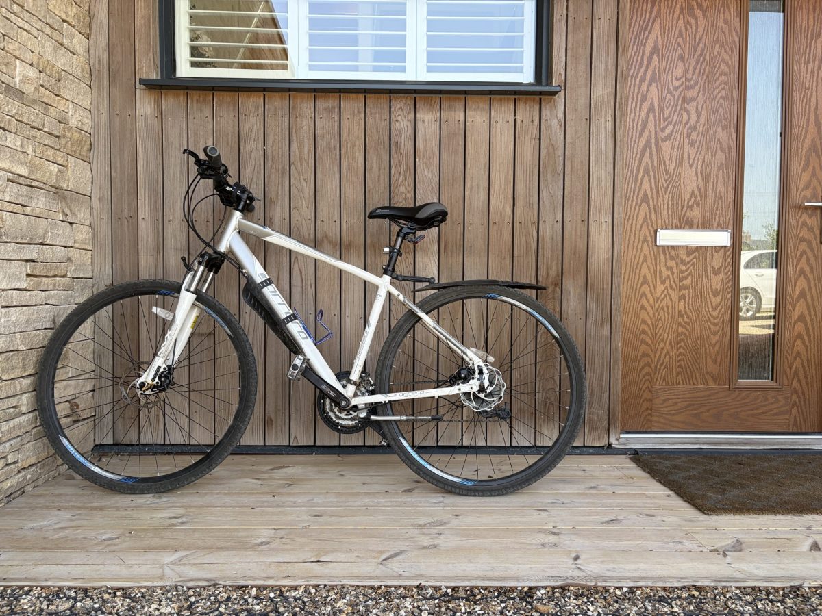Bicycle delivered to the front of a holiday cottage at Silverlake Estate in Dorset