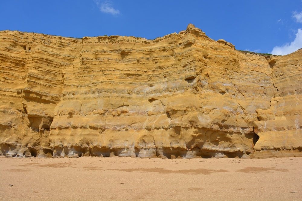 Golden cliff face at West Bay on Dorset's Jurassic Coast