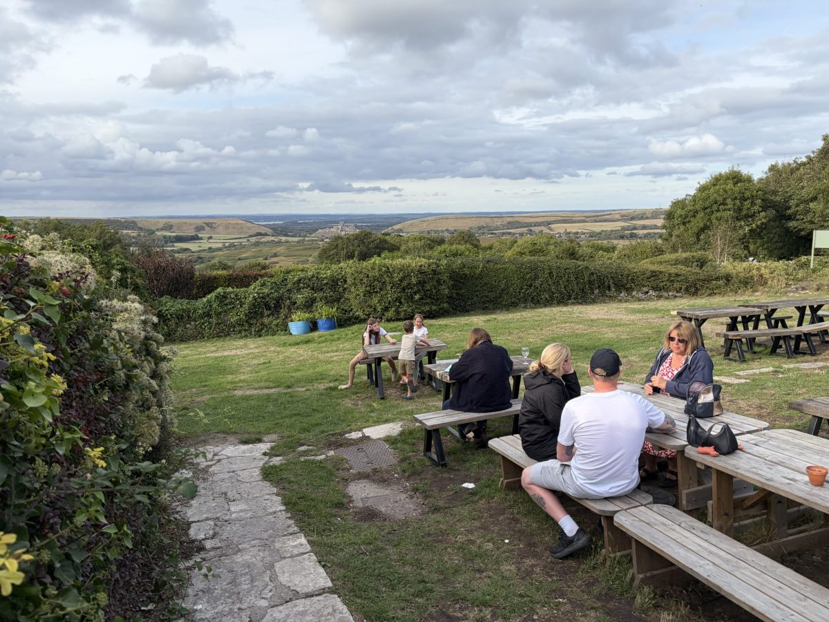 Beer garden at The Scott Arms in Kingston with views across the Purbeck countryside towards Corfe Castle